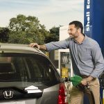 man-pumping-gas-in-shell-easypay-dispenser